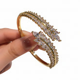 Crystal wheat bangle bracelet close-up styling shot
