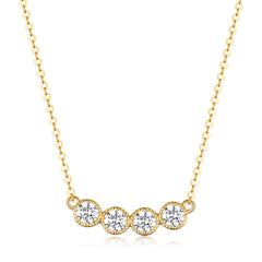 Gold necklace with four round diamonds on a white background