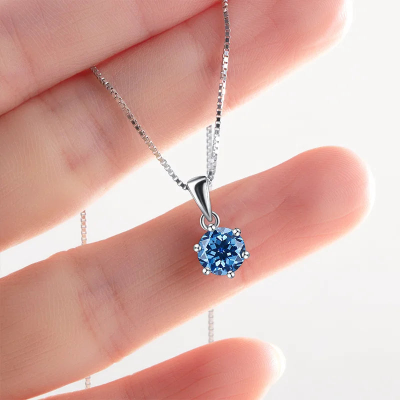 Moissanite pendant necklace with gemstone on silver chain