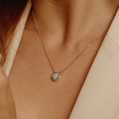 Bubble necklace with moissanite pendant worn on neck