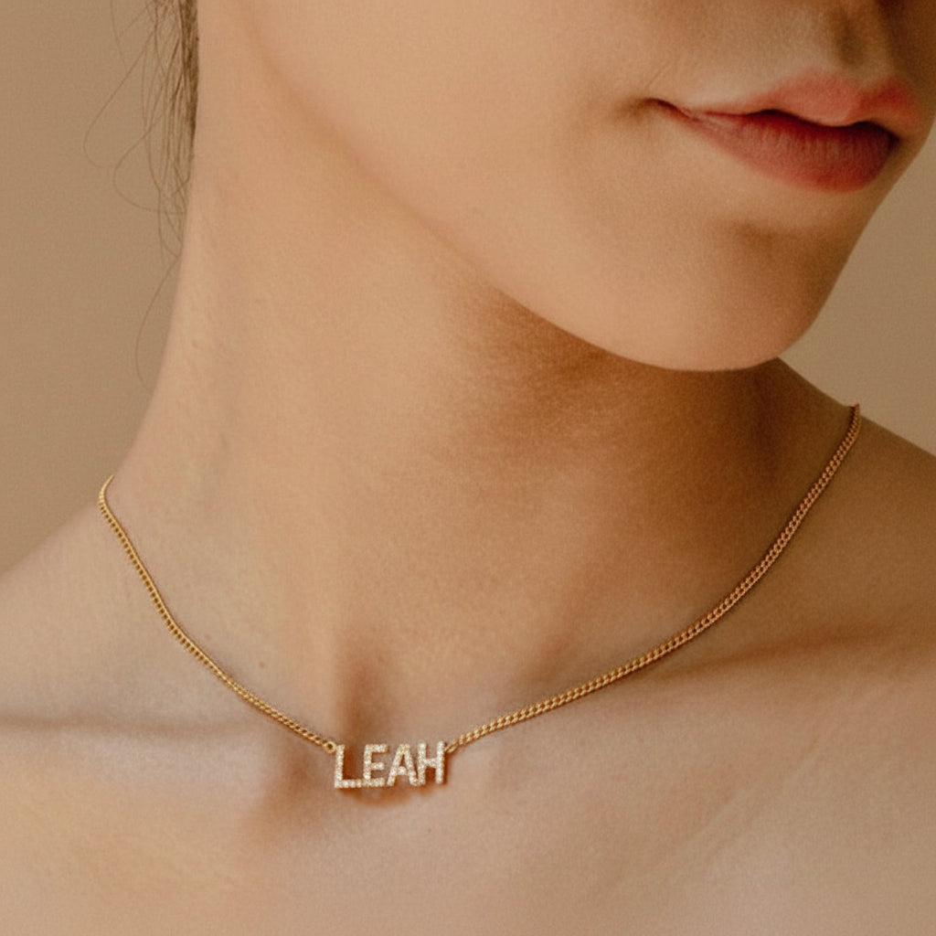 Personalized 925 sterling silver name necklace with zircon details. Adjustable 21cm to 50cm chain. Comes in a gift box.
