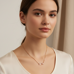 Personalized 925 sterling silver name necklace with zircon details. Adjustable 21cm to 50cm chain. Comes in a gift box. ARU Collection