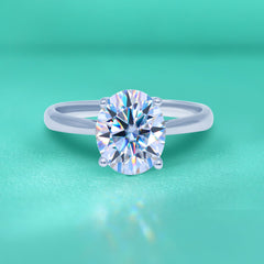 Diamond ring on a teal background
