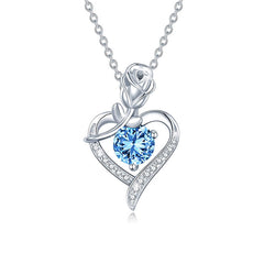 Silver necklace with a heart-shaped pendant featuring a blue gemstone on a white background Heart Rose Moissanite Pendant Necklace S925 Sterling Silver aru collection