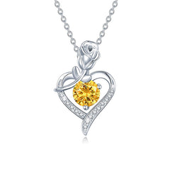 Silver necklace with a yellow gemstone heart pendant on a white background Heart Rose Moissanite Pendant Necklace S925 Sterling Silver aru collection