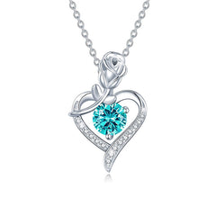 Silver necklace with a heart-shaped pendant featuring a blue gemstone on a white background Heart Rose Moissanite Pendant Necklace S925 Sterling Silver aru collection