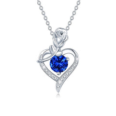 Silver necklace with a blue gemstone heart pendant on a white background Heart Rose Moissanite Pendant Necklace S925 Sterling Silver aru collection 1