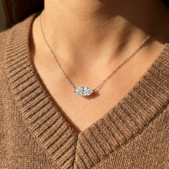 Marquise-cut moissanite pendant on a silver cross-chain with Pt950 plating