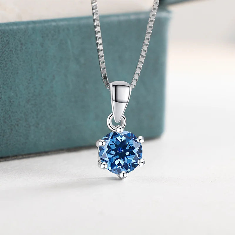 Silver moissanite pendant necklace with coloured stone