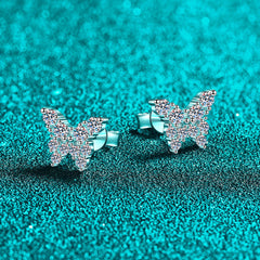 Butterfly-shaped earrings on a teal glittery background  Butterfly Earrings for Women S925 Sterling Silver Moissanite  Aru collection