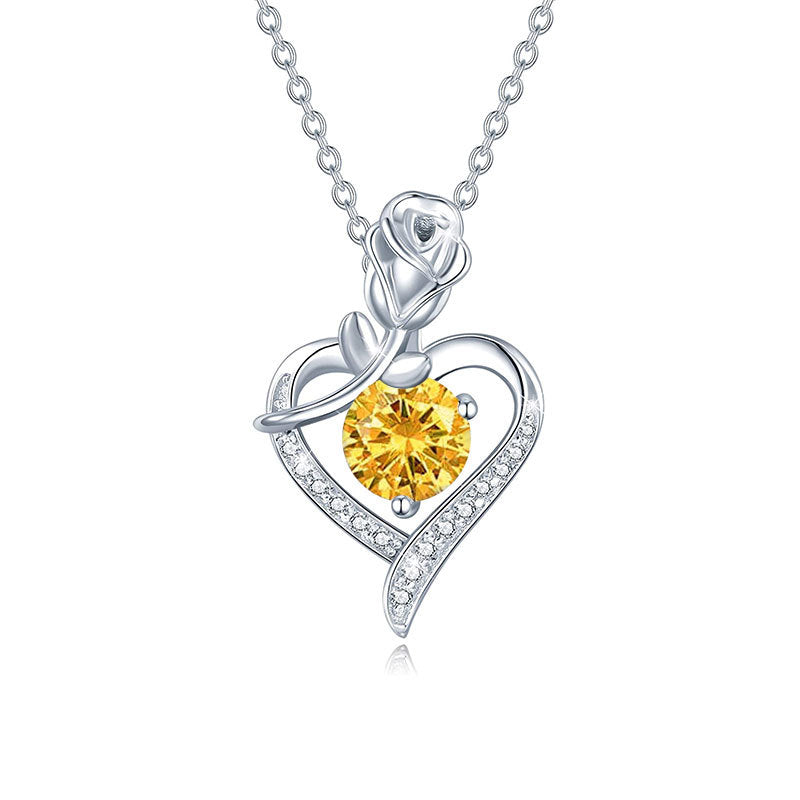 Silver necklace with a yellow gemstone heart pendant on a white background  Heart Rose Moissanite Pendant Necklace S925 Sterling Silver aru collection 