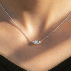 Marquise-cut moissanite pendant on a silver cross-chain with Pt950 plating