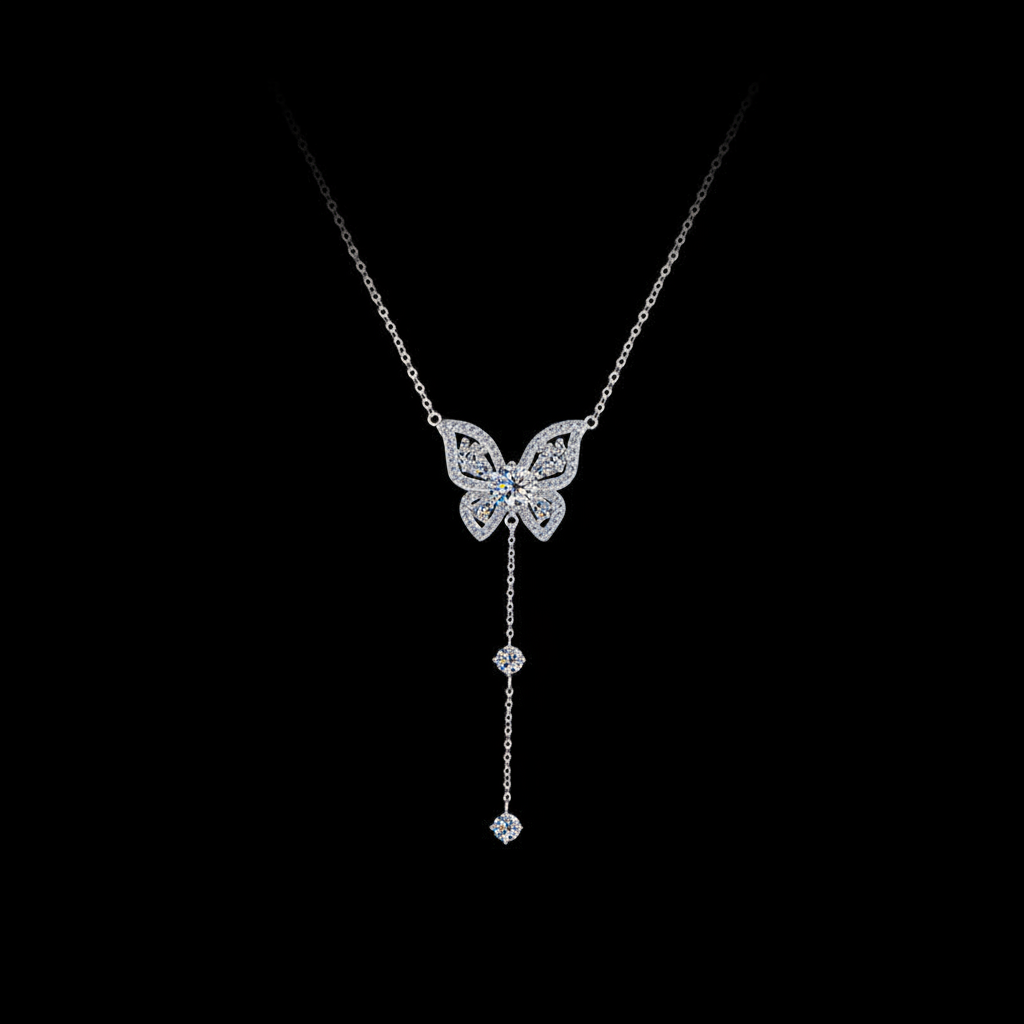 Butterfly necklace with dangling crystals on a black background, branded 'SHINY'.