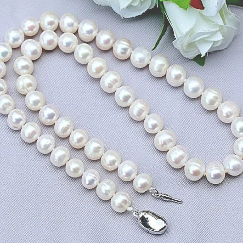 Pearl necklace with silver clasp close-up view